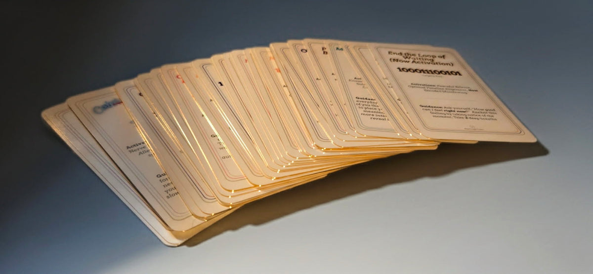 The Spirit Deck Vol. 1 oracle cards fanned out with glowing gold edges